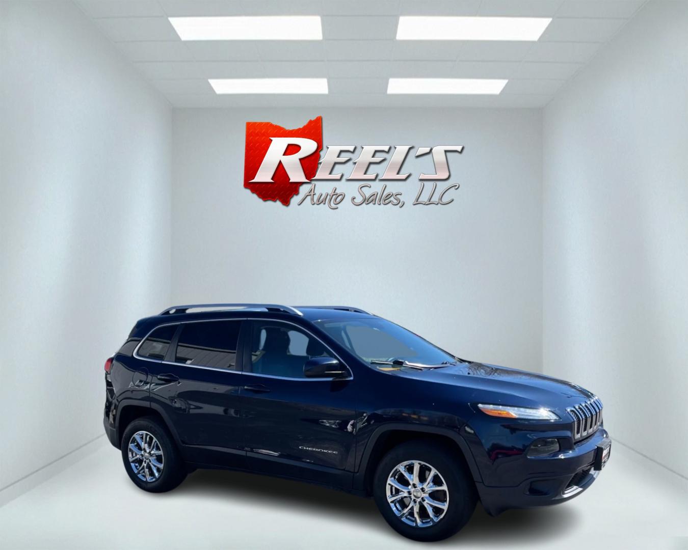 2016 Blue /Black Jeep Cherokee Latitude 4WD (1C4PJMCS1GW) with an 3.2L V6 DOHC 24V engine, 9-Speed Automatic transmission, located at 11115 Chardon Rd. , Chardon, OH, 44024, (440) 214-9705, 41.580246, -81.241943 - Photo#12